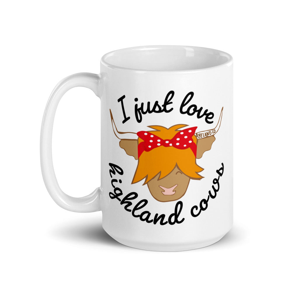 15 oz white ceramic mug with the design of a highland cow and the statement i just love highland cows and maybe three people - side 1