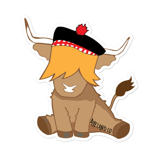 Sticker of a scottish highland cow wearing a glengarry hat