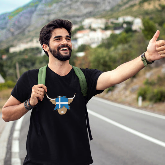man wearing a black scottish highland cow t-shirt