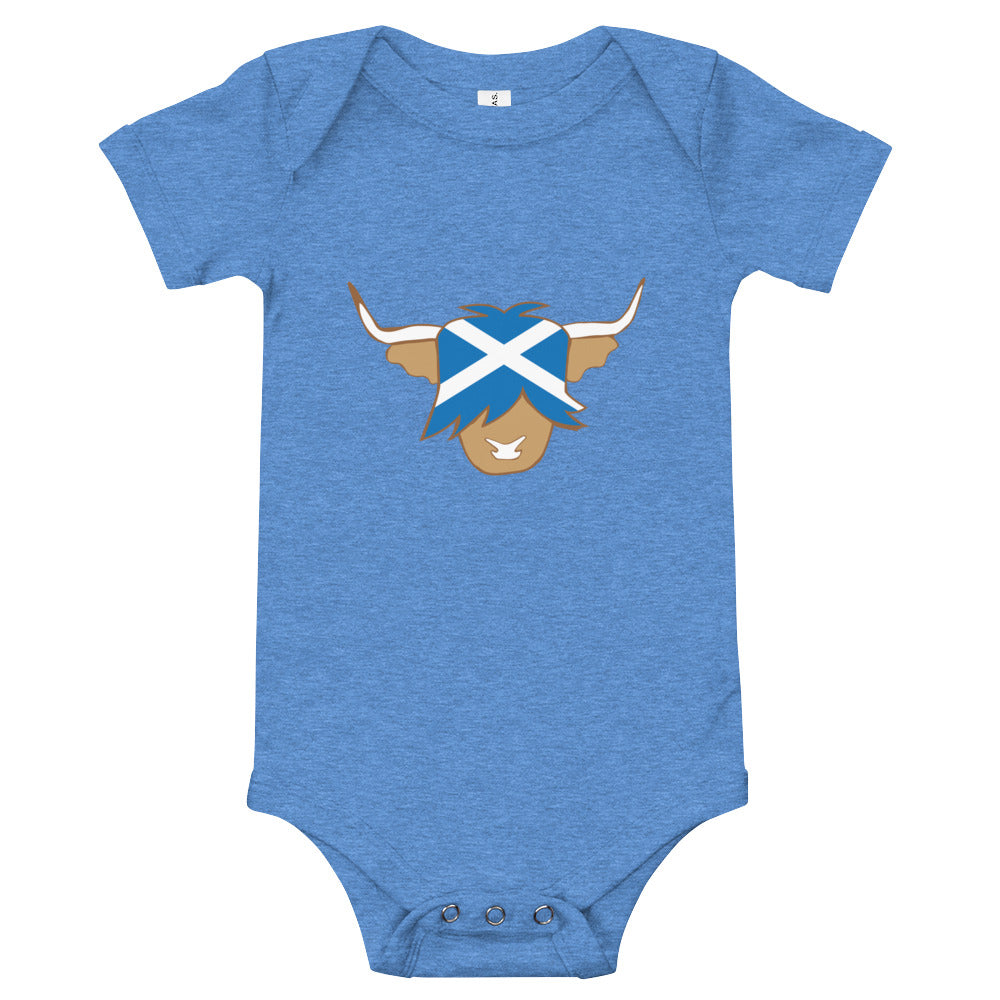 Blue babygrow featuring a super cute Scottish highland cow with the flag of Scotland.