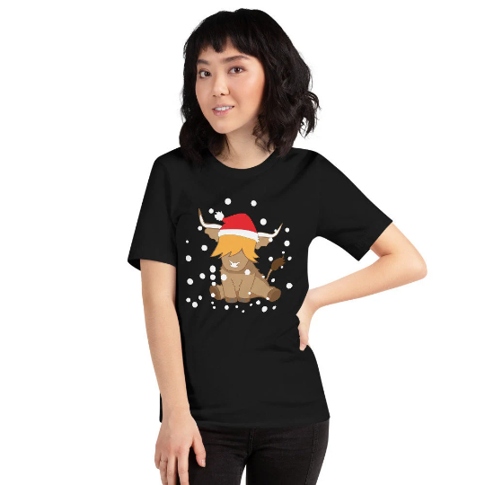 woman wearing a black tshirt of a christmas santa highland cow