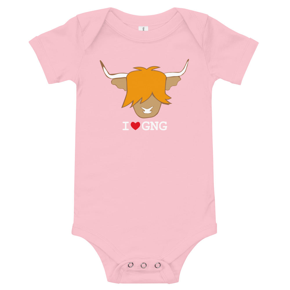 Pink baby bodysuit with a ginger highland cow head on it and the quote I love GNG