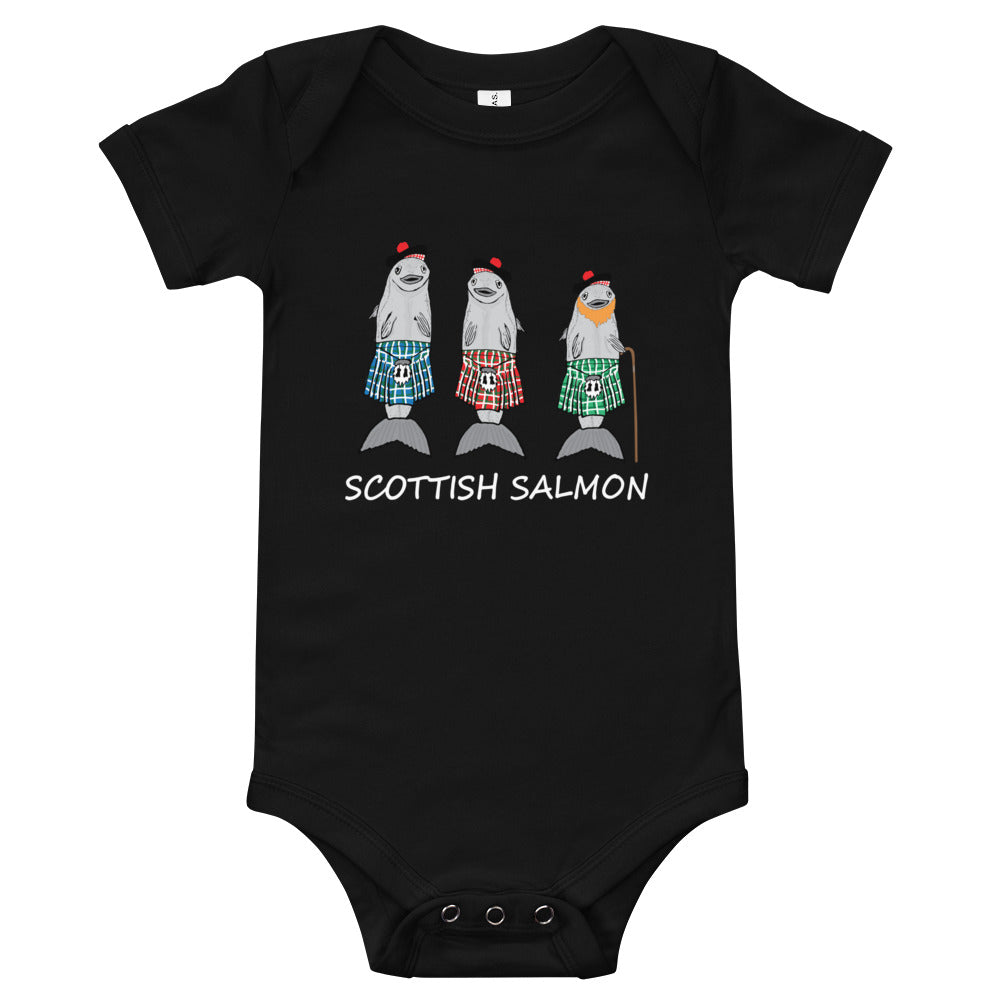 Black babygrow featuring Scottish Salmons dressed with kilts.