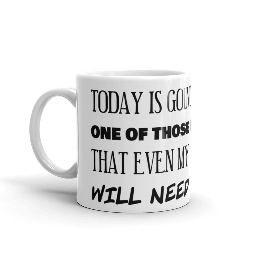 White mug with the statement Today is going to be one of those day that even my coffee will need a whisky 