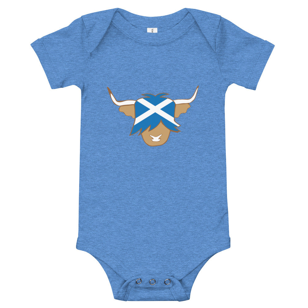 Blue babygrow featuring a super cute Scottish highland cow with the flag of Scotland.