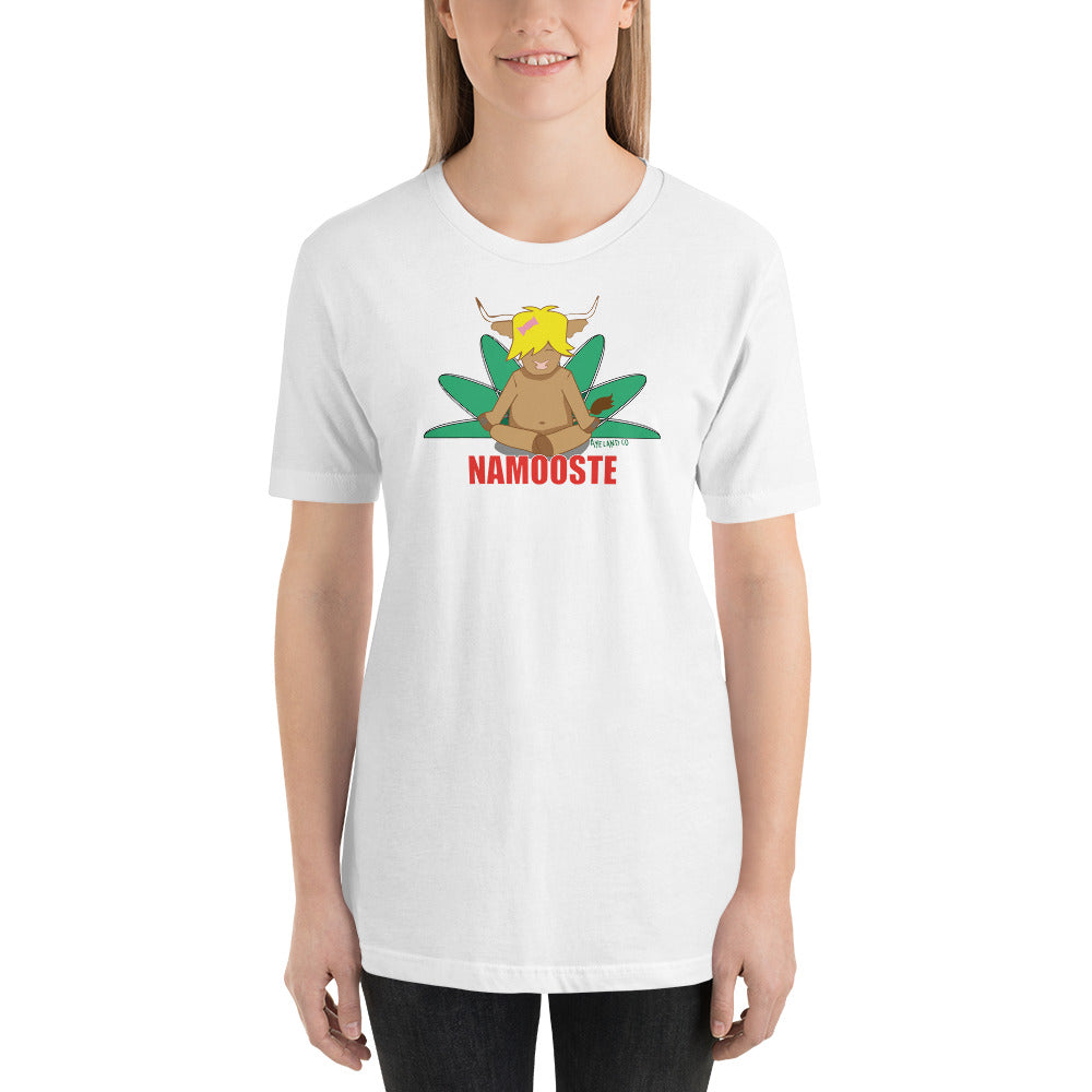 woman wearing a white namooste highland cow t-shirt