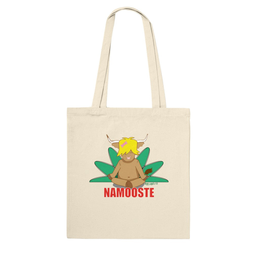 natural cotton tote bag displaying a highland cow in a yoga pose stating namooste