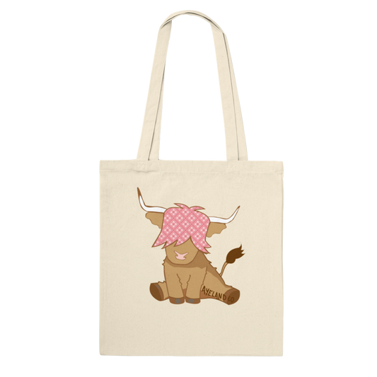 pink highland cow design on a natural cotton tote bag