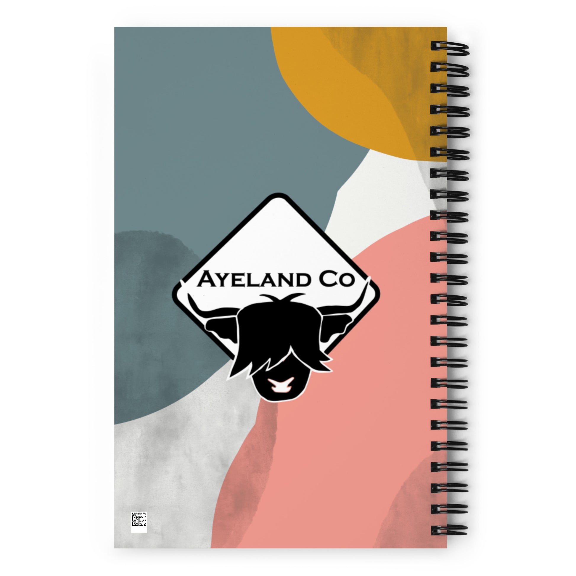 Back of a stylish namooste highland cow notebook
