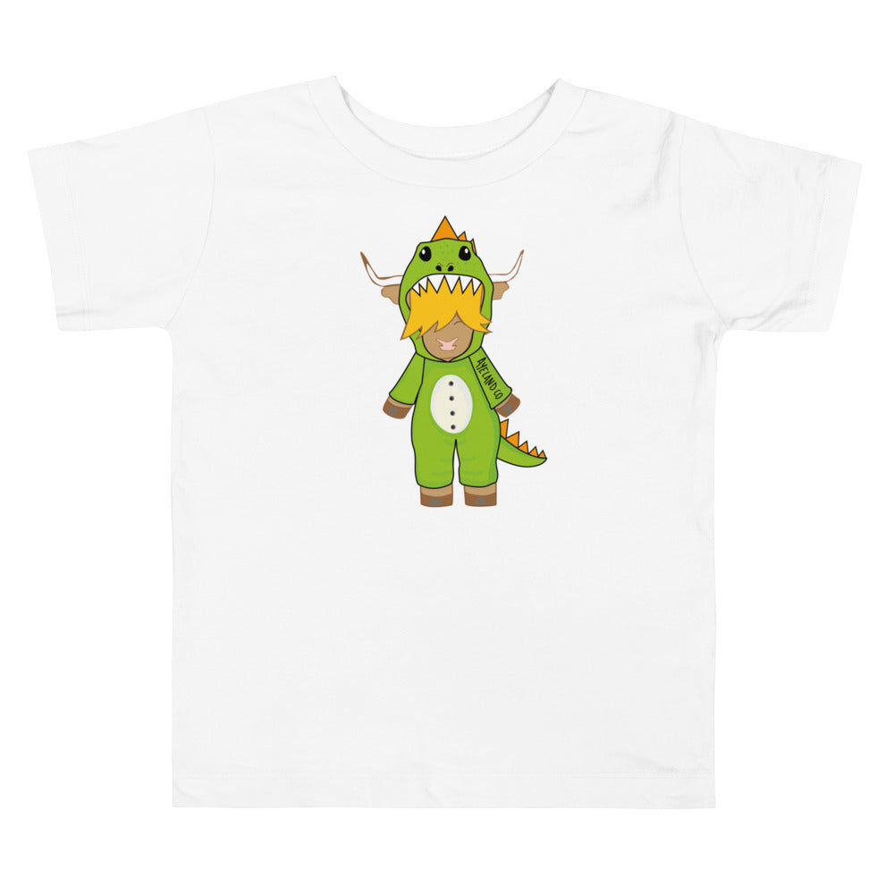 White highland cow kid t-shirt featuring a cute highland cow wearing a T-rex onesie